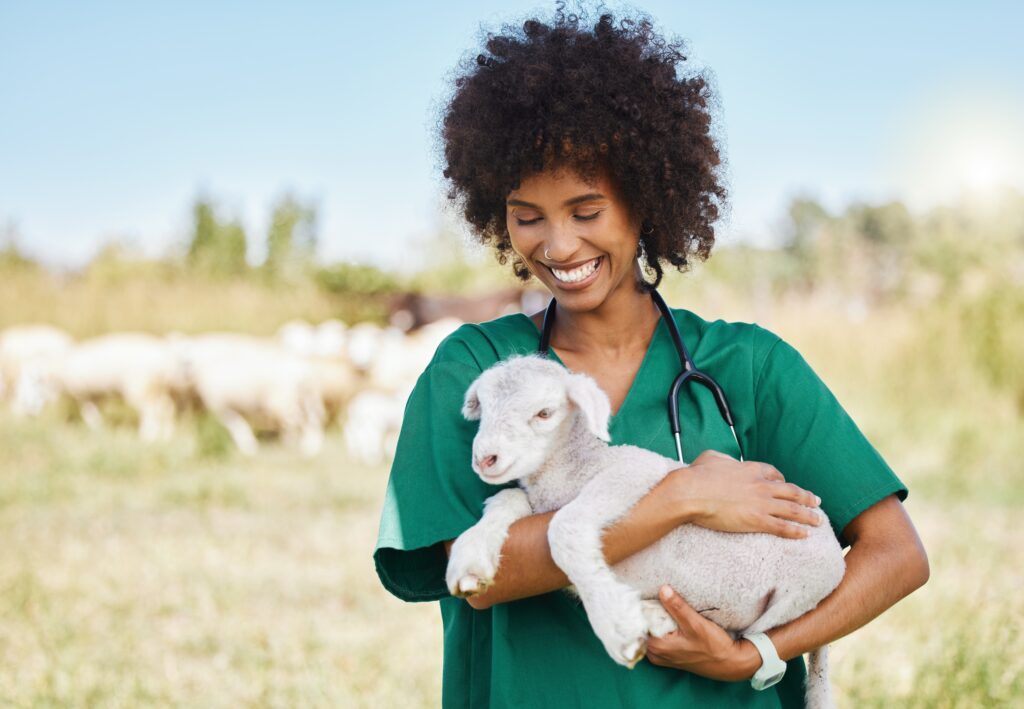 woman holding lamb